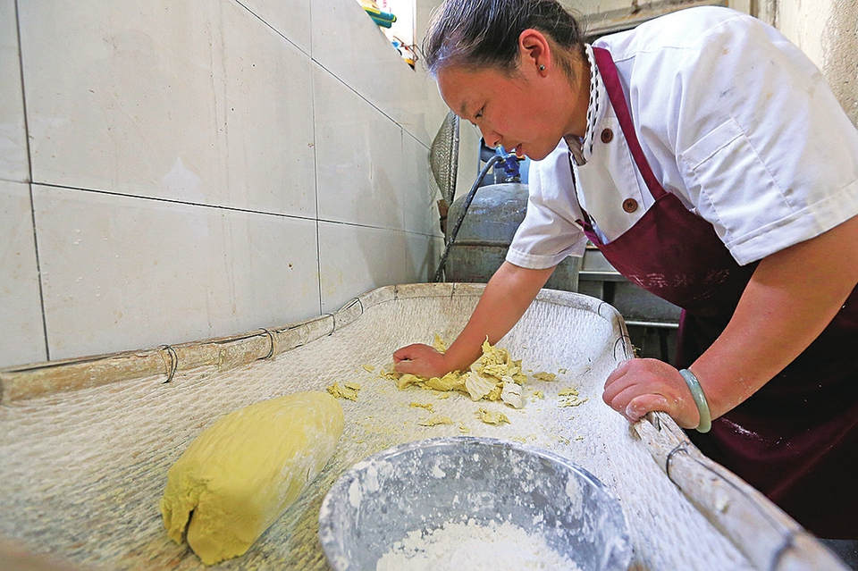 一碗米粉的“幸福味道”:赶过大集、进过大观园,如今有了门店